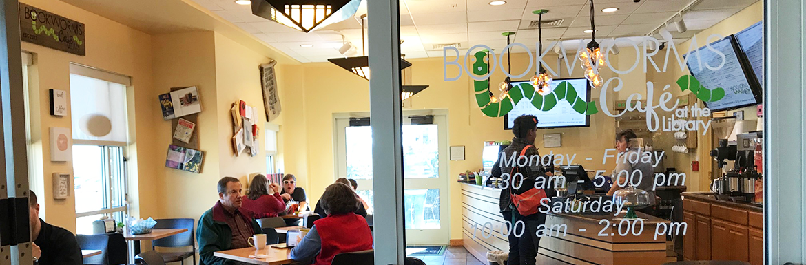 Bookworms Cafe interior image showing guests sitting and talking at tables