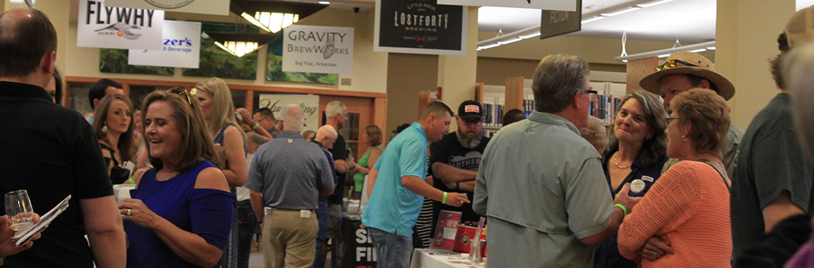 Fundraiser Event held at the library with several attendees and vendors