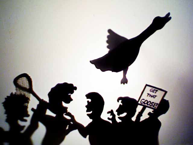 "Goose chase" scene with shadow puppets