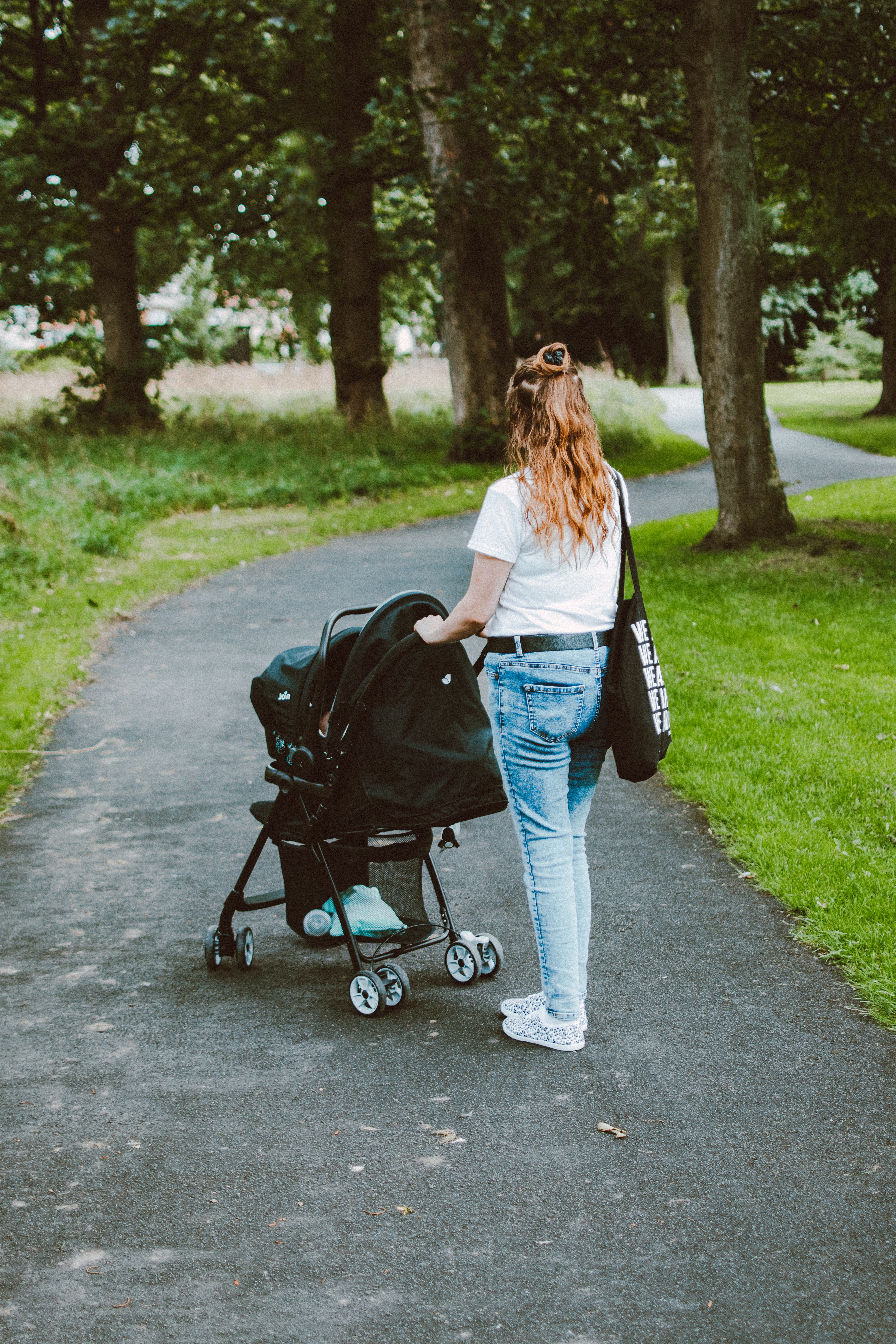 Woman walking with stroller