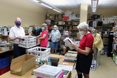 Friends preparing for used book sale