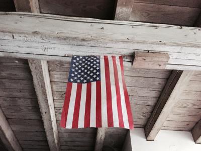 American Flag hanging from ceiling