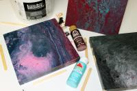 Examples of paint pouring for an upcoming virtual painting class hosted by the Baxter County Library.