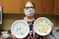 Youth Services Librarian Amy Johnson gets ready for the microwave puff paint virtual workshop.