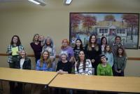 Some of the cast of Little House on the Prairie with the winners of the short story contest at the Library. 