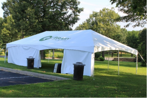 Image of a white tent on the library grounds. 