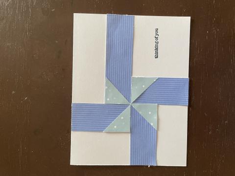 pinwheel card in blue and aqua on a white background