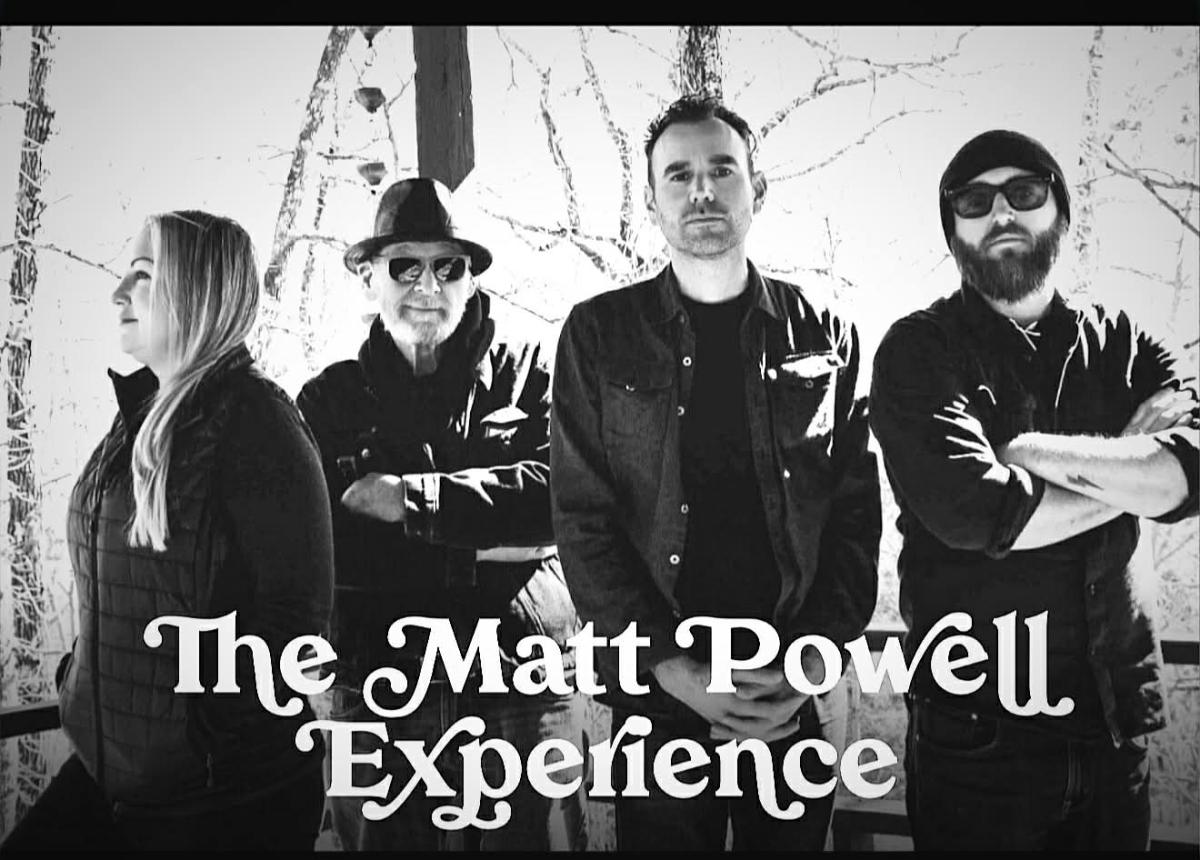 Black and White Photo of the Woman and 3 Men who make up the Matt Powell Experience.